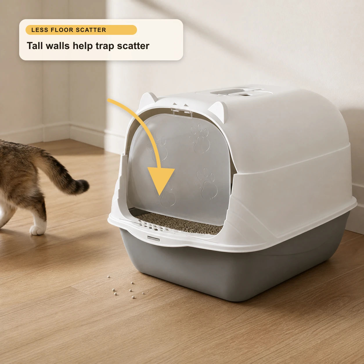 Enclosed cat litter box with tall hooded walls and front flap, showing how the design helps contain kicked litter and reduce floor scatter.